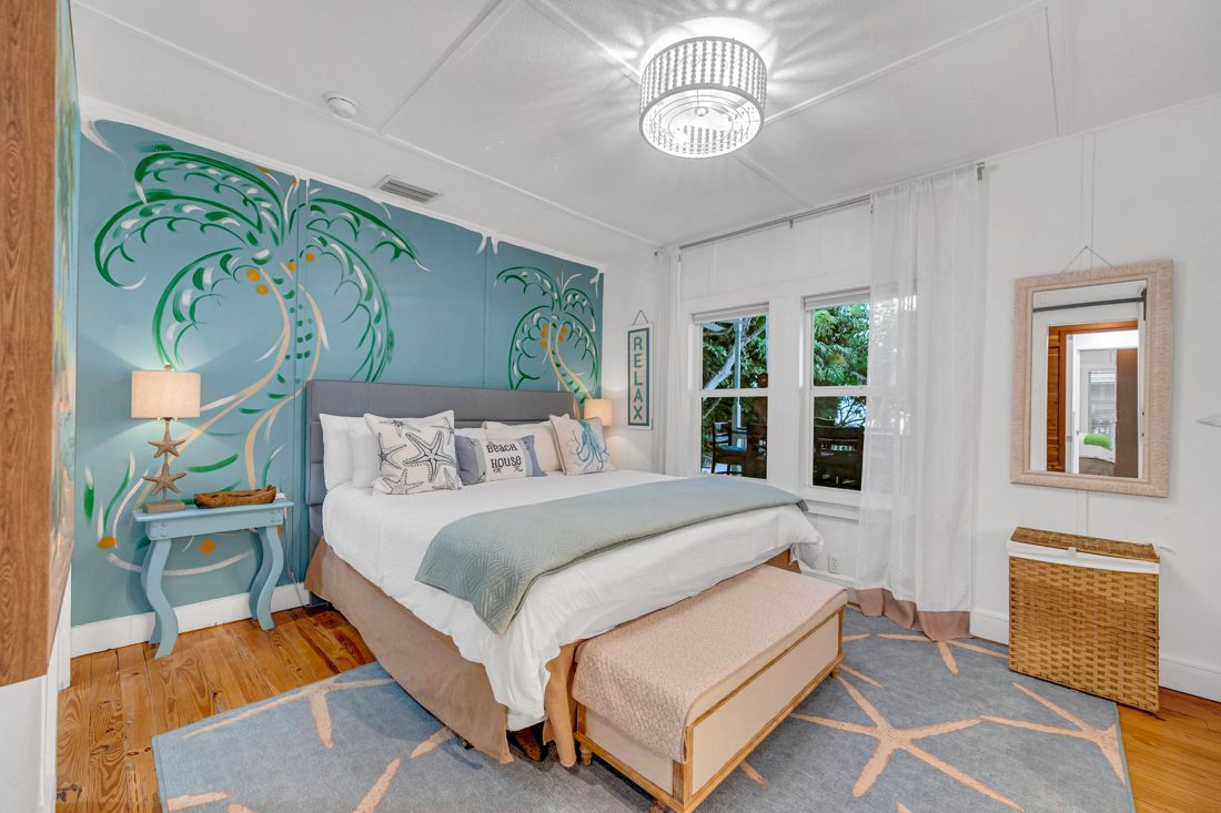 Master bedroom with queen bed and connecting bathroom