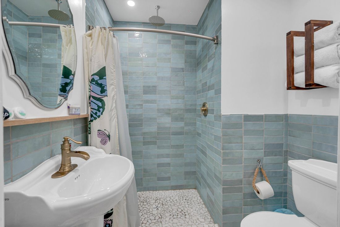 Living room full bathroom at Butterfly House Islamorada