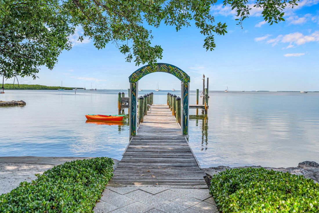 Private waterfront dock with boat slip and parking, great view