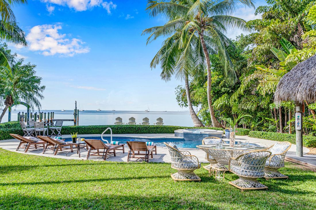 Waterfront and pool at Butterfly House Islamorada