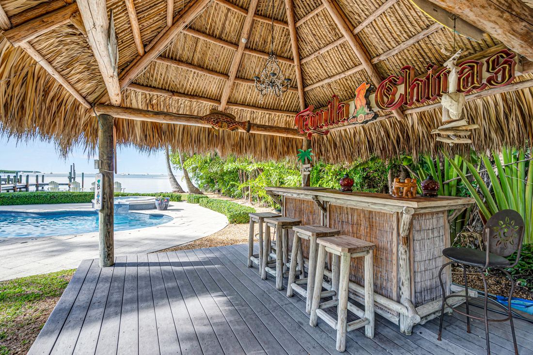 Tiki bar and pool at Butterfly House Islamorada