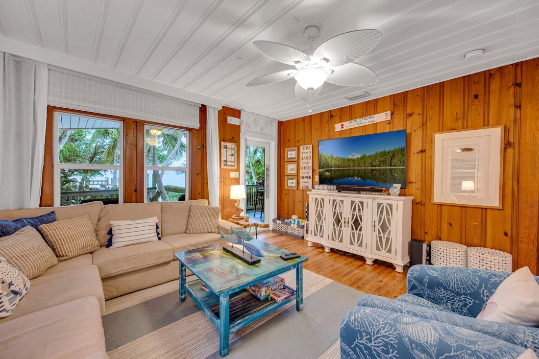 Living room, couch, TV at Butterfly House Islamorada